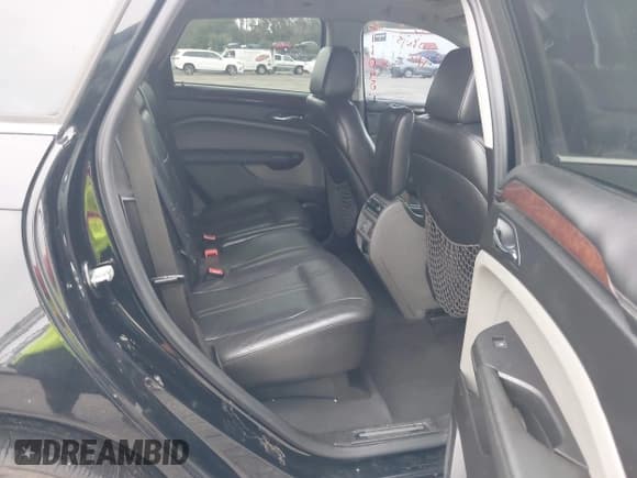 ✅ 2011 Cadillac SRX Premium Collection • VIN: 3GYFNCEY0BS611048 • Lot: 43379880. Listed on IAAI with 157,029 mi. Free auction sales archive from the USA and detailed vehicle history report at DreamBid. Image 8.