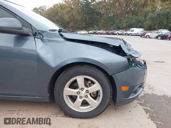 2012 Chevrolet Cruze 1LT z VIN 1G1PF5SC5C7240568, wystawiony jako IAAI lot #43441891 z przebiegiem 100 950 mil mil oraz . Historia ofert i sprzedaży dostępna na DreamBid. Obrazek 17.