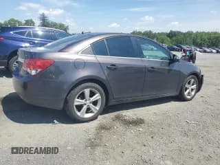 ✅ 2015 Chevrolet Cruze LT • VIN: 1G1PE5SB4F7214428 • Lot: 63314663. Listed on Copart with 127,787 mi. Free auction sales archive from the USA and detailed vehicle history report at DreamBid. Image 3.