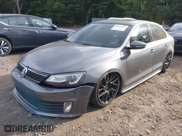 ✅ 2014 Volkswagen Jetta GLI • VIN: 3VW5T7AJ5EM374862 • Lot: 43197013. Listed on IAAI with 71,031 mi. Free auction sales archive from the USA and detailed vehicle history report at DreamBid. Image 2.