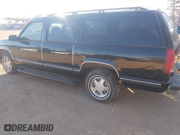 ✅ 1999 GMC Suburban • VIN: 3GKEC16R6XG549656 • Lot: 41403259. Wystawiony na IAAI z przebiegiem 306 548 mil. Bezpłatny archiwum sprzedaży aukcyjnych z USA i szczegółowy raport historii pojazdu na DreamBid. Zdjęcie 3.