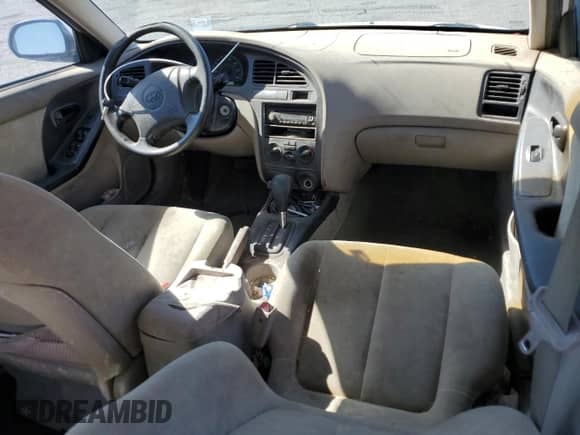 2003 Hyundai Elantra GLS с VIN KMHDN45D13U582382, выставлен на аукционе Copart как лот 61249684 с пробегом Не указан миль и Списание • Salvage title. История ставок и продаж доступна на DreamBid. Изображение 8.