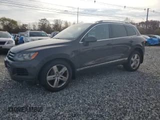 ✅ 2013 Volkswagen Touareg Sport • VIN: WVGEP9BP3DD000942 • Lot: 91008645. Wystawiony na Copart z przebiegiem 157 017 mil. Bezpłatny archiwum sprzedaży aukcyjnych z USA i szczegółowy raport historii pojazdu na DreamBid. Zdjęcie 1.
