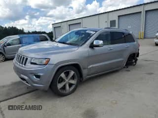 ✅ 2014 Jeep Grand Cherokee Overland • VIN: 1C4RJFCG5EC210163 • Lot: 68894775. Listed on Copart with 205,339 mi. Free auction sales archive from the USA and detailed vehicle history report at DreamBid. Image 1.