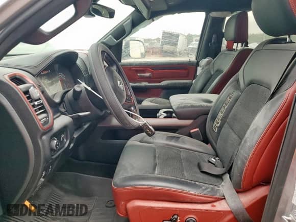 2020 Ram 1500 Rebel с VIN 1C6RRELT7LN299176, выставлен на аукционе Copart как лот 76778334 с пробегом 70 059 миль миль и Списание • Salvage title. История ставок и продаж доступна на DreamBid. Изображение 7.