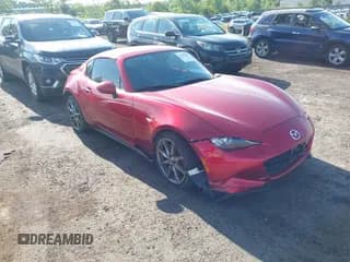✅ 2022 Mazda MX-5 Miata Grand Touring • VIN: JM1NDAM72N0502121 • Lot: 42587846. Listed on IAAI with 18,131 mi. Free auction sales archive from the USA and detailed vehicle history report at DreamBid. Image 1.