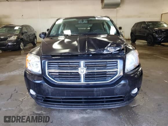 2011 Dodge Caliber Heat с VIN 1B3CB5HA4BD153267, выставлен на аукционе Copart как лот 66669164 с пробегом 113 596 миль миль и Списание • Salvage title. История ставок и продаж доступна на DreamBid. Изображение 5.