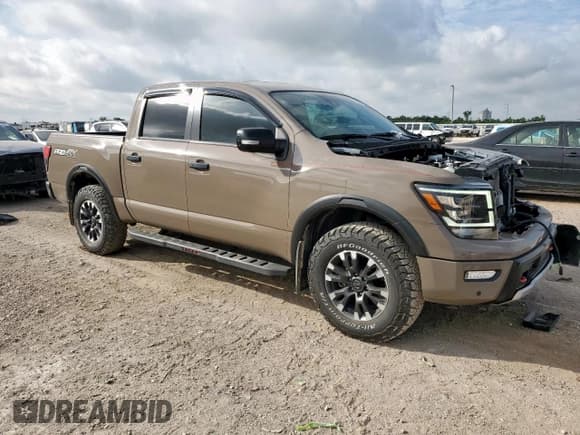 ✅ 2022 Nissan Titan SV • VIN: 1N6AA1ED0NN105552 • Lot: 65369485. Wystawiony na Copart z przebiegiem 48 932 mil. Bezpłatny archiwum sprzedaży aukcyjnych z USA i szczegółowy raport historii pojazdu na DreamBid. Zdjęcie 4.