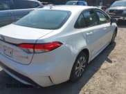 ✅ 2021 Toyota Corolla Hybrid LE • VIN: JTDEAMDE0MJ023312 • Lot: 43011113. Listed on IAAI with 32,696 mi. Free auction sales archive from the USA and detailed vehicle history report at DreamBid. Image 4.