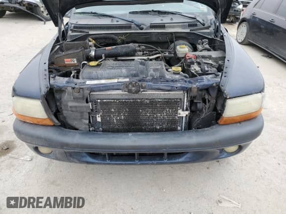 2004 Dodge Dakota Sport с VIN 1D7HG38N04S680272, выставлен на аукционе Copart как лот 44467735 с пробегом Не указан миль и Списание • Salvage title. История ставок и продаж доступна на DreamBid. Изображение 13.