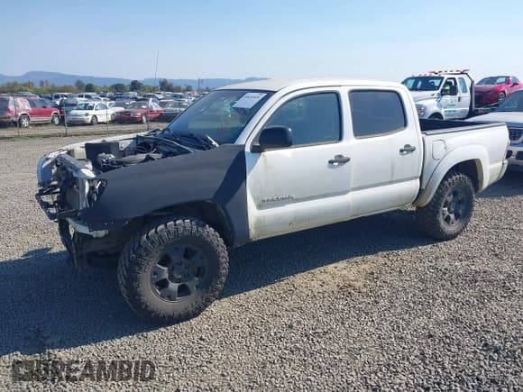✅ 2009 Toyota Tacoma • VIN: 5TELU42N29Z647580 • Lot: 40424920. Listed on IAAI with 119,903 mi. Free auction sales archive from the USA and detailed vehicle history report at DreamBid. Image 2.