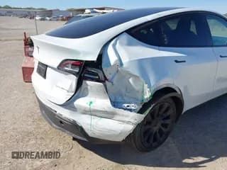 ✅ 2023 Tesla Model Y Long Range • VIN: 7SAYGDEE3PA094297 • Lot: 43496946. Listed on IAAI with 15,262 mi. Free auction sales archive from the USA and detailed vehicle history report at DreamBid. Image 6.