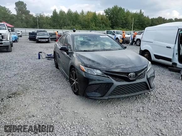 2019 Toyota Camry LE z VIN 4T1B11HK6KU820267, wystawiony jako Copart lot #80095685 z przebiegiem Nie podano mil oraz Szkoda całkowita • Salvage title. Historia ofert i sprzedaży dostępna na DreamBid. Obrazek 13.