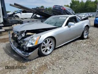 ✅ 2004 Cadillac XLR • VIN: 1G6YV34A145603026 • Lot: 70686185. Wystawiony na Copart z przebiegiem 102 970 mil. Bezpłatny archiwum sprzedaży aukcyjnych z USA i szczegółowy raport historii pojazdu na DreamBid. Zdjęcie 1.