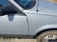 ✅ 1987 Oldsmobile Calais • VIN: 1G3NF14L6HM279358 • Lot: 42526934. Listed on IAAI with 115,666 mi. Free auction sales archive from the USA and detailed vehicle history report at DreamBid. Image 13.