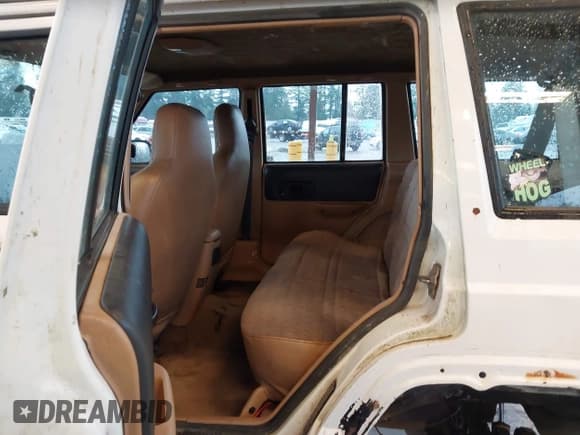 ✅ 1998 Jeep Cherokee Sport • VIN: 1J4FJ68S7WL169885 • Lot: 43792886. Listed on IAAI with 201,014 mi. Free auction sales archive from the USA and detailed vehicle history report at DreamBid. Image 8.