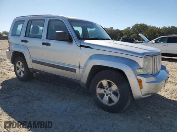 ✅ 2012 Jeep Liberty Sport Latitude • VIN: 1C4PJLAK0CW122338 • Lot: 87413045. Listed on Copart with 292,419 mi. Free auction sales archive from the USA and detailed vehicle history report at DreamBid. Image 4.
