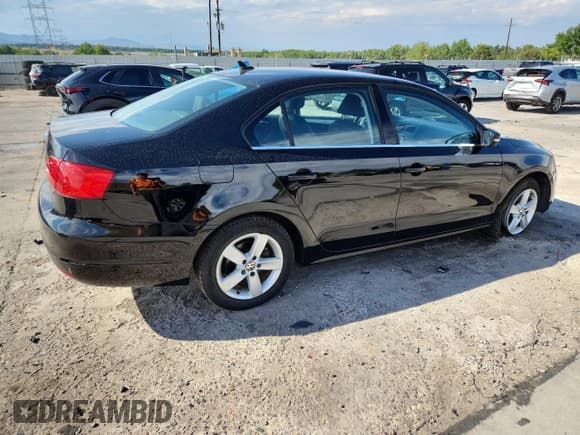 ✅ 2011 Volkswagen Jetta TDI • VIN: 3VWLL7AJ7BM108844 • Lot: 69700685. Listed on Copart with 126,598 mi. Free auction sales archive from the USA and detailed vehicle history report at DreamBid. Image 3.