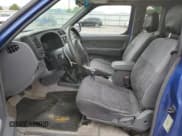 ✅ 1999 Nissan Frontier XE • VIN: 1N6ED26Y6XC303079 • Lot: 68223355. Wystawiony na Copart z przebiegiem 106 197 mil. Bezpłatny archiwum sprzedaży aukcyjnych z USA i szczegółowy raport historii pojazdu na DreamBid. Zdjęcie 7.