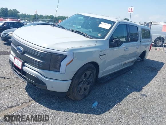 ✅ 2023 Ford F-150 Lightning Pro • VIN: 1FT6W1EVXPWG35446 • Лот: 42750723. Опубликован ранее на IAAI с пробегом 45 348 миль. Бесплатный доступ к архиву аукционных продаж из США и подробный отчёт об истории автомобиля на DreamBid. Изображение 2.