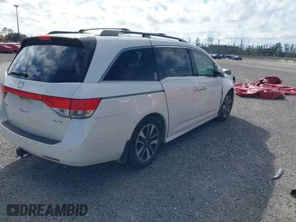 ✅ 2015 Honda Odyssey Touring Elite • VIN: 5FNRL5H91FB083785 • Лот: 43235259. Опубликован ранее на IAAI с пробегом 226 384 миль. Бесплатный доступ к архиву аукционных продаж из США и подробный отчёт об истории автомобиля на DreamBid. Изображение 4.