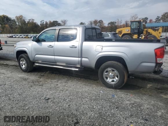 ✅ 2016 Toyota Tacoma TRD Sport • VIN: 3TMBZ5DN3GM004519 • Лот: 91908875. Опубликован ранее на Copart с пробегом 104 621 миль. Бесплатный доступ к архиву аукционных продаж из США и подробный отчёт об истории автомобиля на DreamBid. Изображение 2.