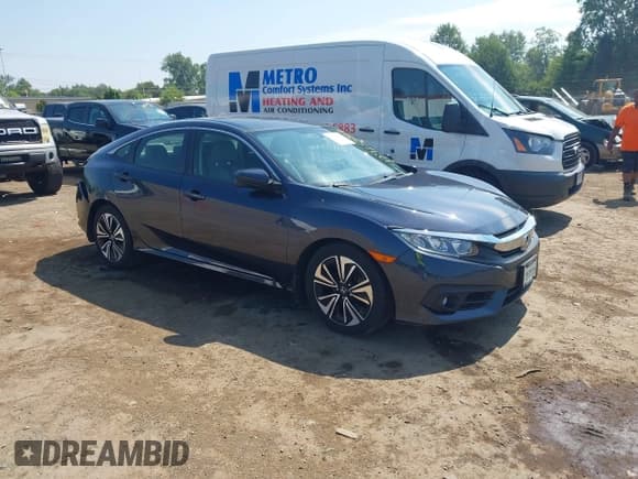 ✅ 2018 Honda Civic EX-T • VIN: JHMFC1F35JX023886 • Lot: 42915493. Listed on IAAI with 69,527 mi. Free auction sales archive from the USA and detailed vehicle history report at DreamBid. Image 1.