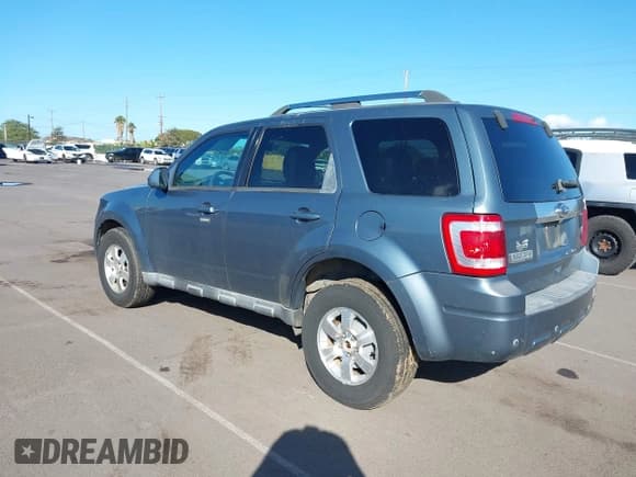 ✅ 2010 Ford Escape Limited • VIN: 1FMCU9E76AKC03441 • Lot: 43881706. Listed on IAAI with 104,859 mi. Free auction sales archive from the USA and detailed vehicle history report at DreamBid. Image 3.