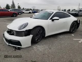 ✅ 2021 Porsche 911 Carrera • VIN: WP0AA2A99MS205692 • Лот: 45731394. Опубликован ранее на Copart с пробегом 24 627 миль. Бесплатный доступ к архиву аукционных продаж из США и подробный отчёт об истории автомобиля на DreamBid. Изображение 1.
