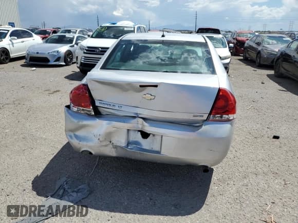 ✅ 2014 Chevrolet Impala LT • VIN: 2G1WB5E37E1185365 • Лот: 69102054. Опубликован ранее на Copart с пробегом 159 699 миль. Бесплатный доступ к архиву аукционных продаж из США и подробный отчёт об истории автомобиля на DreamBid. Изображение 6.