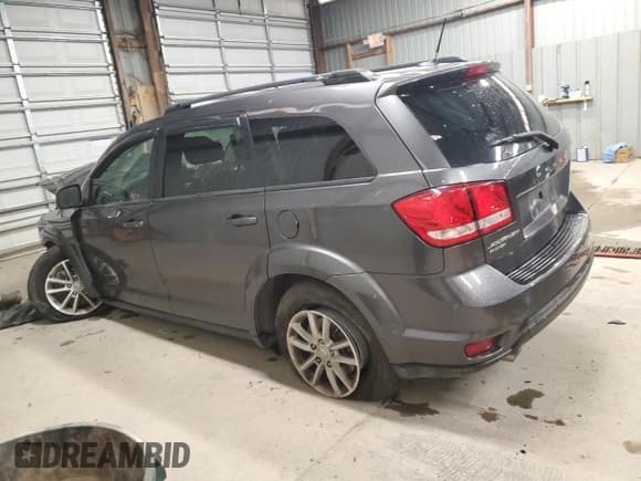 ✅ 2014 Dodge Journey SXT • VIN: 3C4PDDBGXET193093 • Lot: 86901385. Listed on Copart with 148,672 mi. Free auction sales archive from the USA and detailed vehicle history report at DreamBid. Image 2.