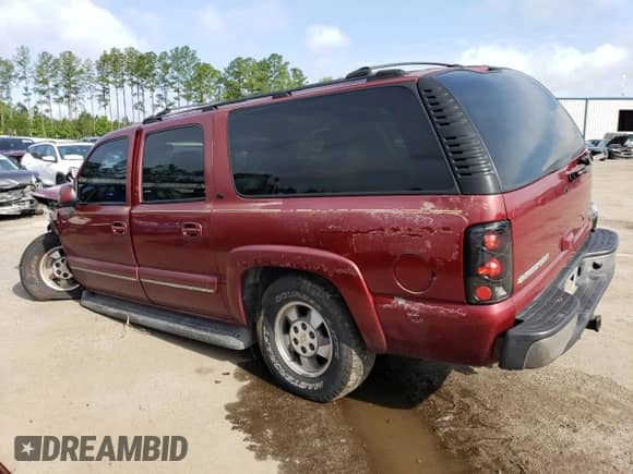 2003 Chevrolet Suburban LT with VIN 1GNFK16Z13J261899, listed as a Copart auction lot 70806384 with Not provided miles and Salvage title. Bid and sale history available at DreamBid. Image 2.