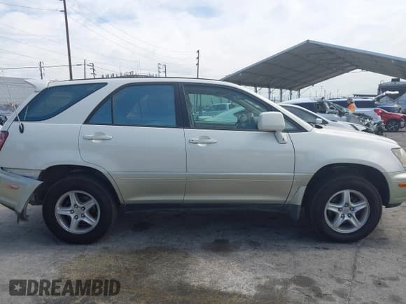 ✅ 2000 Lexus RX 300 • VIN: JT6HF10U9Y0132266 • Lot: 43009397. Wystawiony na IAAI z przebiegiem 175 445 mil. Bezpłatny archiwum sprzedaży aukcyjnych z USA i szczegółowy raport historii pojazdu na DreamBid. Zdjęcie 13.