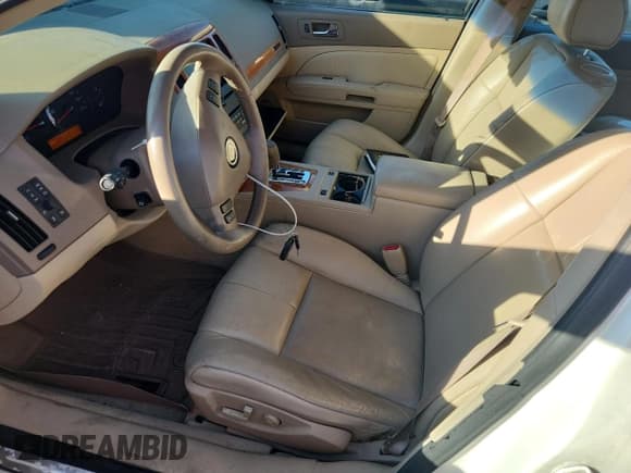 ✅ 2006 Cadillac STS • VIN: 1G6DW677360218886 • Lot: 84905405. Listed on Copart with 103,466 mi. Free auction sales archive from the USA and detailed vehicle history report at DreamBid. Image 7.