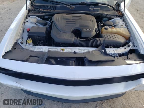 ✅ 2014 Dodge Challenger SXT • VIN: 2C3CDYAG7EH209786 • Lot: 80151564. Wystawiony na Copart z przebiegiem 129 689 mil. Bezpłatny archiwum sprzedaży aukcyjnych z USA i szczegółowy raport historii pojazdu na DreamBid. Zdjęcie 11.