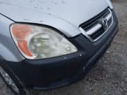 ✅ 2004 Honda CR-V EX • VIN: JHLRD78894C050711 • Lot: 43751727. Wystawiony na IAAI z przebiegiem 176 932 mil. Bezpłatny archiwum sprzedaży aukcyjnych z USA i szczegółowy raport historii pojazdu na DreamBid. Zdjęcie 6.