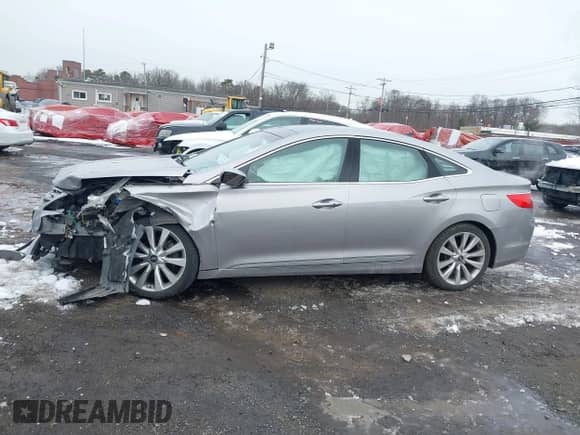 2014 Hyundai Azera Limited with VIN KMHFH4JG6EA361378, listed as a IAAI auction lot 41557210 with 58,561 mi miles and . Bid and sale history available at DreamBid. Image 14.
