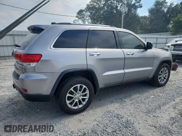 ✅ 2015 Jeep Grand Cherokee Limited • VIN: 1C4RJFBM2FC937088 • Lot: 80723215. Listed on Copart with 119,037 mi. Free auction sales archive from the USA and detailed vehicle history report at DreamBid. Image 3.