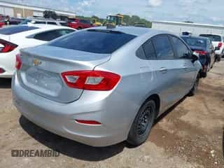 2016 Chevrolet Cruze LS z VIN 1G1BC5SM8G7287871, wystawiony jako IAAI lot #42738767 z przebiegiem 124 115 mil mil oraz . Historia ofert i sprzedaży dostępna na DreamBid. Obrazek 4.