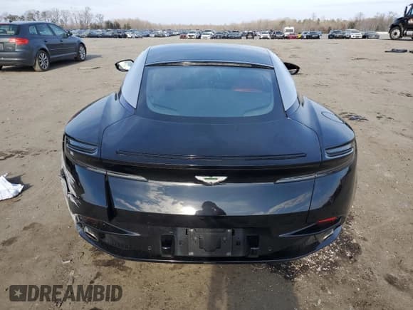 ✅ 2018 Aston Martin DB11 • VIN: SCFRMFAV8JGL03322 • Лот: 86810004. Опубликован ранее на Copart с пробегом Не указан. Бесплатный доступ к архиву аукционных продаж из США и подробный отчёт об истории автомобиля на DreamBid. Изображение 6.