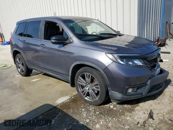 ✅ 2021 Honda Passport EX-L • VIN: 5FNYF7H50MB011873 • Lot: 63999955. Listed on Copart with 86,739 mi. Free auction sales archive from the USA and detailed vehicle history report at DreamBid. Image 4.