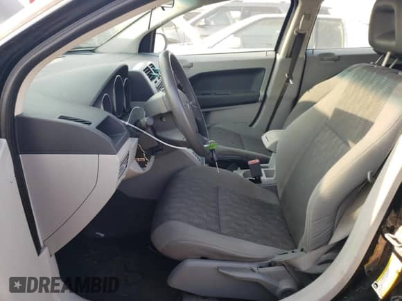 2007 Dodge Caliber SXT с VIN 1B3HB48B37D375296, выставлен на аукционе Copart как лот 69231854 с пробегом 93 885 миль миль и Списание • Salvage title. История ставок и продаж доступна на DreamBid. Изображение 7.