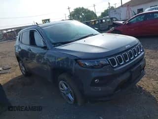 2023 Jeep Compass Latitude with VIN 3C4NJDBN7PT520731, listed as a IAAI auction lot 42964857 with 12,861 mi miles and . Bid and sale history available at DreamBid. Image 1.