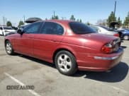 ✅ 2000 Jaguar S-Type V6 • VIN: SAJDA01C7YFL42448 • Lot: 66258735. Listed on Copart with 154,212 mi. Free auction sales archive from the USA and detailed vehicle history report at DreamBid. Image 2.