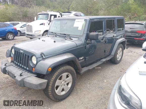 ✅ 2007 Jeep Wrangler Unlimited Sahara • VIN: 1J4GB59197L200251 • Lot: 41801513. Listed on IAAI with 200,612 mi. Free auction sales archive from the USA and detailed vehicle history report at DreamBid. Image 2.