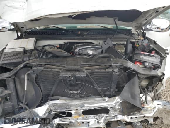 2004 Chevrolet Silverado 1500 LS z VIN 1GCEC14V84Z108022, wystawiony jako Copart lot #73192974 z przebiegiem 161 919 mil mil oraz Szkoda całkowita • Salvage title. Historia ofert i sprzedaży dostępna na DreamBid. Obrazek 11.