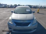 ✅ 2014 Nissan Versa S • VIN: 3N1CN7APXEK455119 • Лот: 43158129. Опубликован ранее на IAAI с пробегом 132 334 миль. Бесплатный доступ к архиву аукционных продаж из США и подробный отчёт об истории автомобиля на DreamBid. Изображение 6.