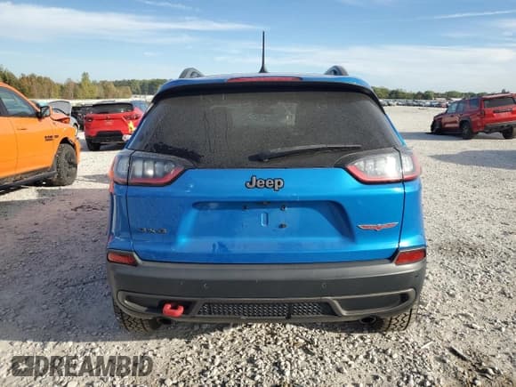 ✅ 2019 Jeep Cherokee Trailhawk Elite • VIN: 1C4PJMBX4KD352779 • Lot: 85080285. Listed on Copart with 56,985 mi. Free auction sales archive from the USA and detailed vehicle history report at DreamBid. Image 6.