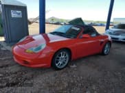 ✅ 2004 Porsche Boxster • VIN: WP0CA29824S620793 • Lot: 69280155. Listed on Copart with 76,906 mi. Free auction sales archive from the USA and detailed vehicle history report at DreamBid. Image 1.