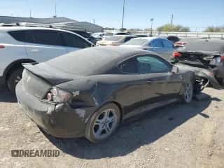 2007 Hyundai Tiburon GS z VIN KMHHM66D27U236507, wystawiony jako Copart lot #41334155 z przebiegiem 97 162 mil mil oraz Szkoda całkowita • Salvage title. Historia ofert i sprzedaży dostępna na DreamBid. Obrazek 3.